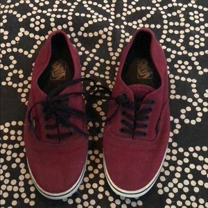 Maroon vans with black laces